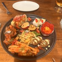   at Unique (V) Pizzeria SUKHASANA in Osaka