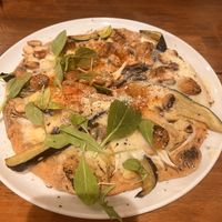   at Unique (V) Pizzeria SUKHASANA in Osaka