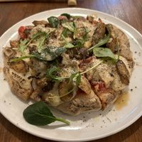 The pizza with ‘sausage’ and tempeh  at Unique (V) Pizzeria SUKHASANA in Osaka