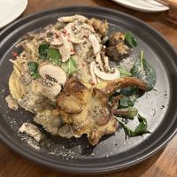 Pasta with cashew based cheese, mushrooms md a soy milk cream.  at Unique (V) Pizzeria SUKHASANA in Osaka