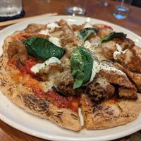  at Unique (V) Pizzeria SUKHASANA in Osaka