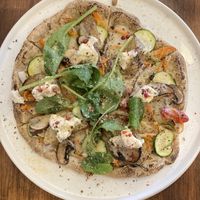 Pizza with cashew cheese   at Unique (V) Pizzeria SUKHASANA in Osaka