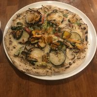 Pizza like I’ve never had before. The vegan cheese was vegan cheese, but the roast veggies and base were delicious  at Unique (V) Pizzeria SUKHASANA in Osaka