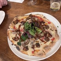 Pizza  at Unique (V) Pizzeria SUKHASANA in Osaka