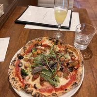   at Unique (V) Pizzeria SUKHASANA in Osaka