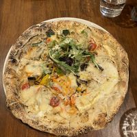   at Unique (V) Pizzeria SUKHASANA in Osaka