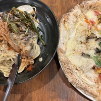   at Unique (V) Pizzeria SUKHASANA in Osaka