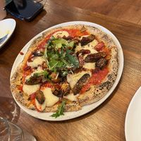   at Unique (V) Pizzeria SUKHASANA in Osaka