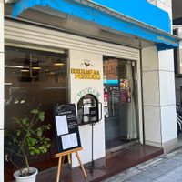   at Unique (V) Pizzeria SUKHASANA in Osaka