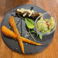 Mixed entree - fried young corn, sautéd carrot and spices, avo with fava bean marinade  at Unique (V) Pizzeria SUKHASANA in Osaka
