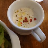 garlic soup with pink peppercorn  at Unique (V) Pizzeria SUKHASANA in Osaka