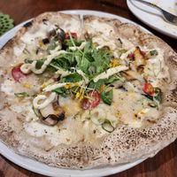  at Unique (V) Pizzeria SUKHASANA in Osaka