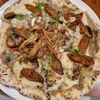  at Unique (V) Pizzeria SUKHASANA in Osaka