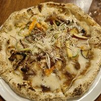 at Unique (V) Pizzeria SUKHASANA in Osaka