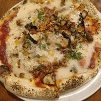  at Unique (V) Pizzeria SUKHASANA in Osaka