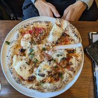  at Unique (V) Pizzeria SUKHASANA in Osaka