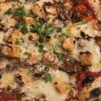   at Unique (V) Pizzeria SUKHASANA in Osaka