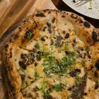  at Unique (V) Pizzeria SUKHASANA in Osaka