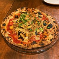 Pizza  at Unique (V) Pizzeria SUKHASANA in Osaka