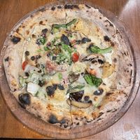 Pizza Ortolana  at Unique (V) Pizzeria SUKHASANA in Osaka