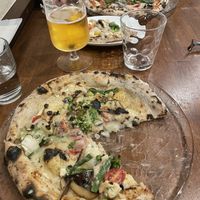   at Unique (V) Pizzeria SUKHASANA in Osaka