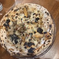   at Unique (V) Pizzeria SUKHASANA in Osaka