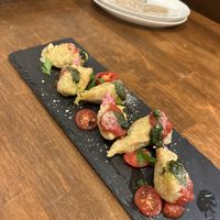   at Unique (V) Pizzeria SUKHASANA in Osaka