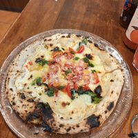  at Unique (V) Pizzeria SUKHASANA in Osaka