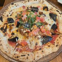 Red hot chili pepper pizza at Unique (V) Pizzeria SUKHASANA in Osaka
