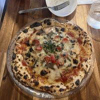   at Unique (V) Pizzeria SUKHASANA in Osaka