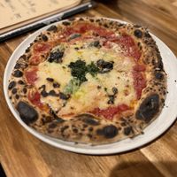   at Unique (V) Pizzeria SUKHASANA in Osaka