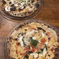   at Unique (V) Pizzeria SUKHASANA in Osaka