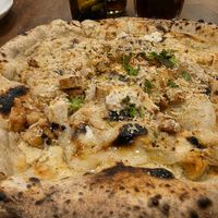  at Unique (V) Pizzeria SUKHASANA in Osaka