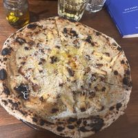   at Unique (V) Pizzeria SUKHASANA in Osaka