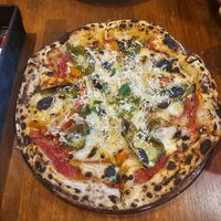  at Unique (V) Pizzeria SUKHASANA in Osaka