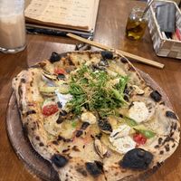   at Unique (V) Pizzeria SUKHASANA in Osaka