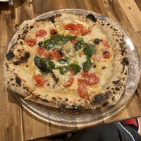   at Unique (V) Pizzeria SUKHASANA in Osaka