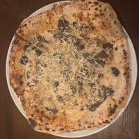  at Unique (V) Pizzeria SUKHASANA in Osaka