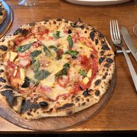   at Unique (V) Pizzeria SUKHASANA in Osaka