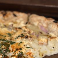   at Unique (V) Pizzeria SUKHASANA in Osaka