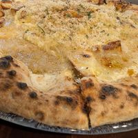  at Unique (V) Pizzeria SUKHASANA in Osaka