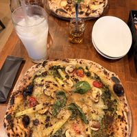   at Unique (V) Pizzeria SUKHASANA in Osaka