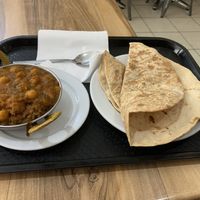 Medium sized eggplant curry and chickpea curry with vegan rotis. Hit the spot.   at City Indian Cuisine in Adelaide