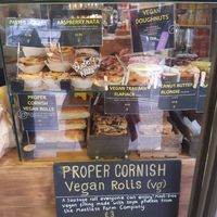 Vegan doughnuts and sausage rolls shown here! at Hopper & Bean - Winchmore Hill in North London