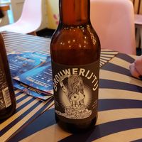 A drink with a fliwer burger. at Flower Burger in Amsterdam