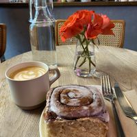 Vanilla cinnamon bun and oat latte   at Room and Rumours Coffee in Edinburgh