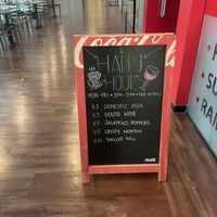 Happy Hour sign at Rock N Roll Sushi in New Orleans