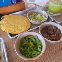 We started eating it...but this is the trio dish (guacamole and two salsas) at Bartaco in Denver