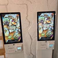 Two kiosks right when you walk in at Plant Cafe & Kitchen - Yeonnam in Seoul