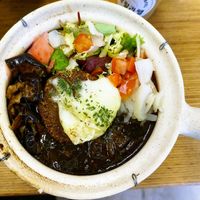 Black curry bowl at GangNam Falafel in Paris